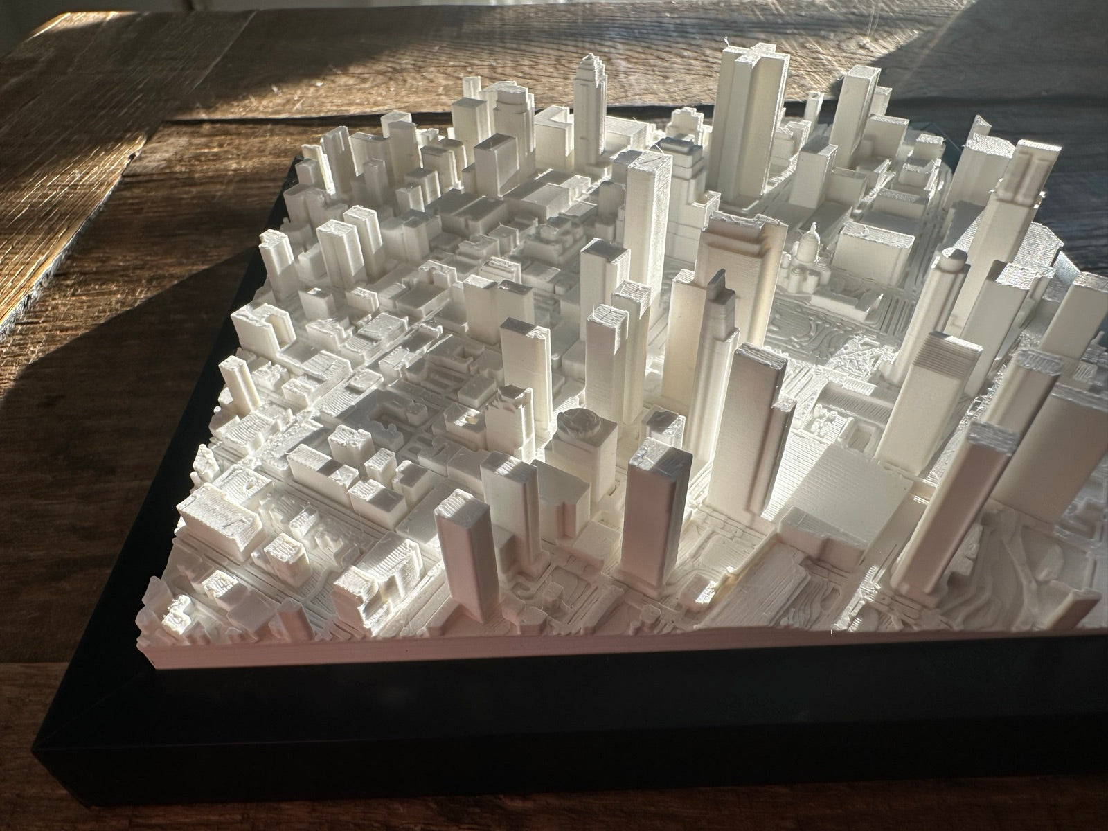 A Mini City Prints framed cityscape in a room