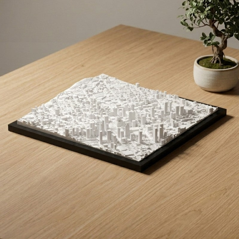 A 12 by 12 inch city frame hanging on a wall
