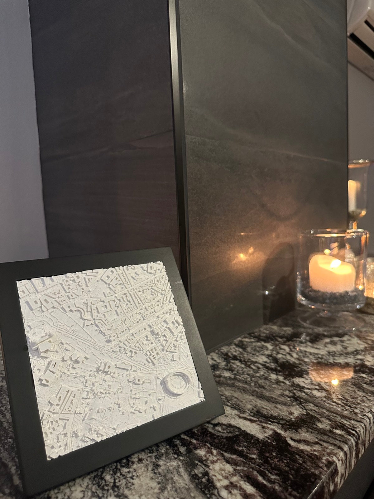 A framed Mini City Prints cityscape in a real home