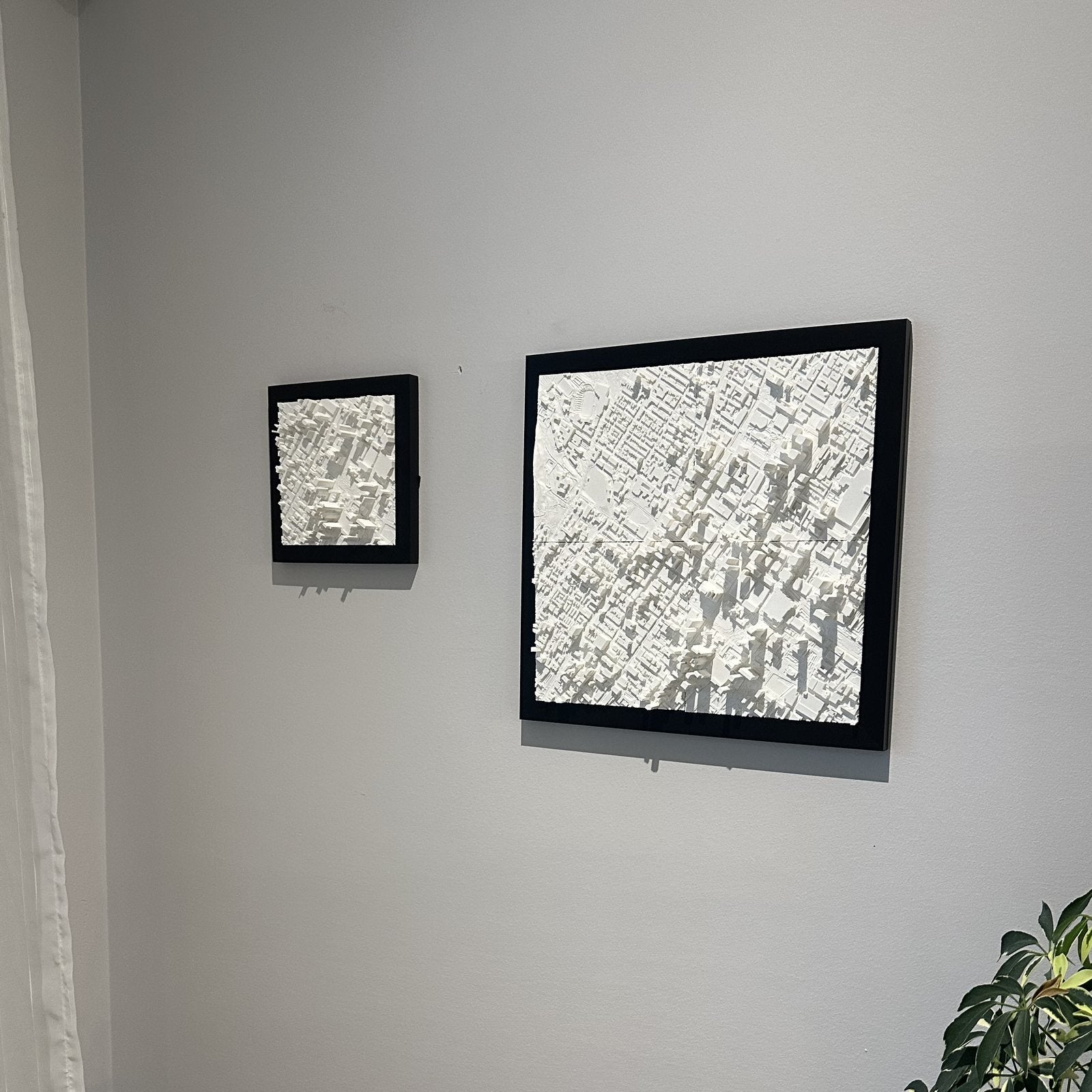Two Mini City Prints framed cityscapes hung together on a wall
